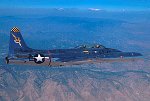 One of several in-flight photographs over Mojave by professional photographer Ted Carlson, who does lots of great work for the US Air Force.  <br><br>Copyright 2000 by Ted Carlson.  