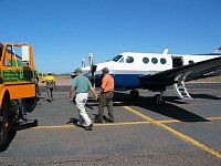 Refueling in Loreto, BCS, Mexico, Doug and John walk over to pay the fuel bill.  