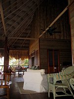 The villas have soaring ceilings and thatched roofs.  