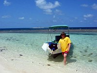 John with our boat on Silk Cayes.  