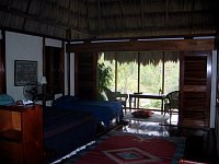 Doug's bedroom in the Francis Ford Coppola villa at Blancaneaux Lodge.  Note screen porched at far end.  