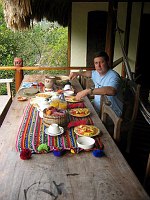 John with our breakfast room service order at Blancaneaux.  