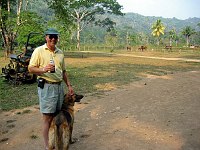 Doug with a new-found friend having a Coke after visiting the caves.  