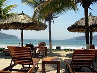 Villa del Sol's private area of the beach, fronting Zihuatanejo Bay, approximately in its center.  